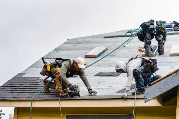 Professional Gutter Installation technician working in Hardwick, MA